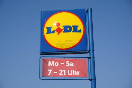 Photo for Advertising sign of a lidl store in germany with blue sky in the background - Royalty Free Image