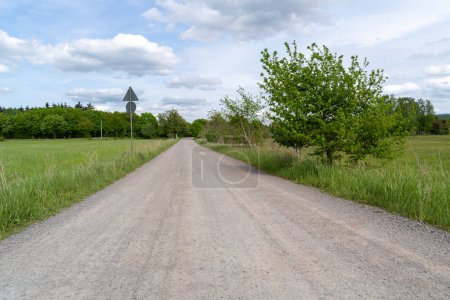 Gravel road in the landscape 