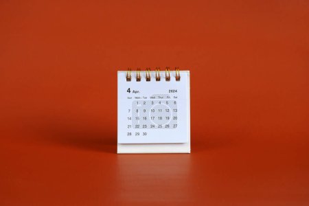 Abril 2024 calendario de meses sobre fondo rojo suave