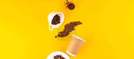 Eco friendly coffee accessories. White coffee cup and paper cup with beans and melted coffee. Yellow background. Copy space