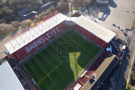 Photo for Barnsley FC Football Club Oakwell Stadium from above drone aerial view blue sky - Royalty Free Image