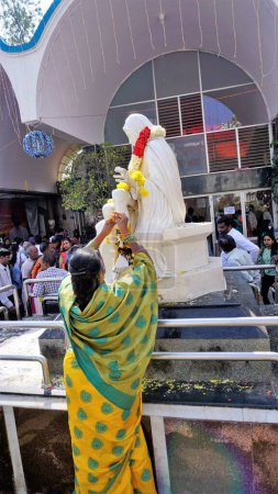 Photo for Bangalore,Karnataka,India-January 01 2023: Catholic Christians praying to saint mary statue in St.marys Basilica or Velankannimatha church. - Royalty Free Image