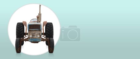 Téléchargez les photos : Front view old blue and brown tractor on white circle on green and blue sky background, object, construction, work, vintage, copy space - en image libre de droit