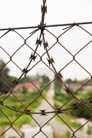 A detailed view of a chain link fence, showcasing its intricate pattern and construction.
