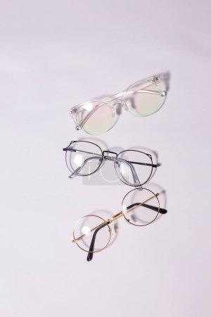 Different glasses on a beautiful light background