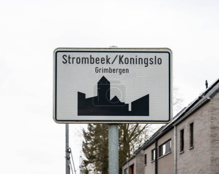 Photo for Grimbergen, Flemish Brabant Region -  Belgium - Feb. 19 2023 - White signboard of the municipality of Strombeek - Koningslo, a part of the city of Grimbergen - Royalty Free Image