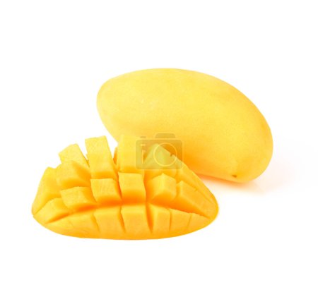 Photo for Ripe yellow Mangoes with cut half in cubes isolated on white background. - Royalty Free Image