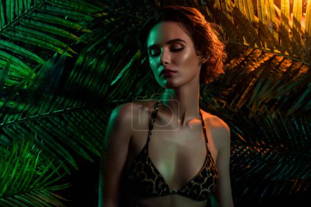 Photo for Portrait of sensual woman visiting ocean seaside tropics posing photographing advertising natural extract cosmetics. - Royalty Free Image
