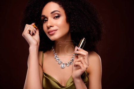 Photo for Photo of happy chic classy lady look mirror applying mascara for large smoky eyelashes on dark color background. - Royalty Free Image