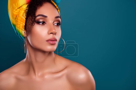 Photo for Portrait of dream lady tribe princess look empty space advertise diverse cosmetics isolated blue color background. - Royalty Free Image