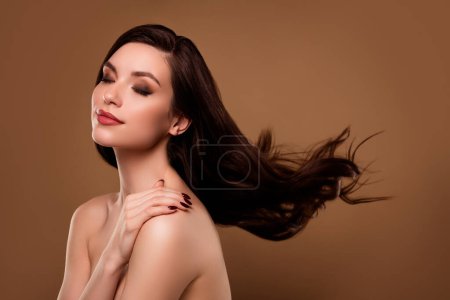Photo for Photo of gorgeous lady apply touch bodycare lotion new formula shampoo for flying hair over pastel color background. - Royalty Free Image