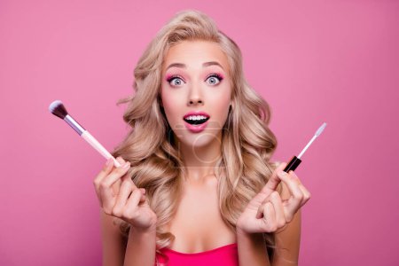 Photo for Photo of sweet excited lady prepare for barbie festival apply blush mascara with brushes on pink background. - Royalty Free Image