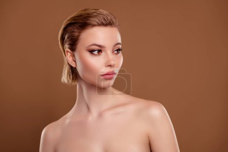 Photo for Photo of dreamy shiny lady nude shoulders looking empty space isolated brown color background. - Royalty Free Image
