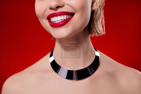 Photo for Photo of charming shiny woman naked shoulders smiling red pomade white teeth isolated red maroon color background. - Royalty Free Image