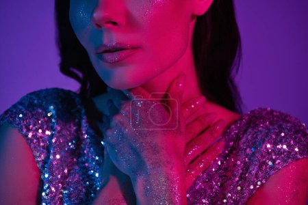 Photo for Cropped photo of elegant luxurious lady make up bright glitter on arms enjoy carnival event on neon color background. - Royalty Free Image
