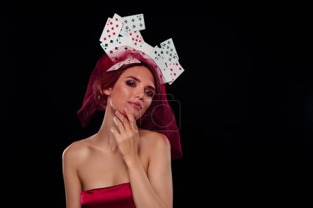 Photo for Charming halloween character lady role playing evil queen from Alice in wonderland wear casino cards hat veil. - Royalty Free Image
