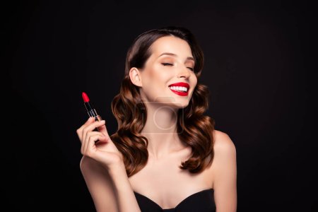 Photo for Photo of chic classy lady prepare for vip private party applying new pomade over dark color background. - Royalty Free Image