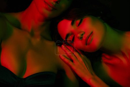 Photo for Photo of adorable stunning ladies nude shoulders smiling sleeping isolated dark color background. - Royalty Free Image