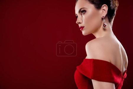 Photo for Photo of confident cool lady naked shoulders expensive earrings empty space isolated ruby color background. - Royalty Free Image