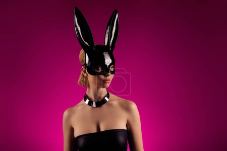 Photo for Photo of attractive fancy lady in rabbit costume advertising on empty space underwear store promo over pink background. - Royalty Free Image