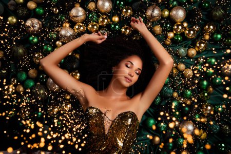 Photo for Top view photo of stunning gorgeous lady celebrate luxury christmas event occasion lying glowing decor. - Royalty Free Image