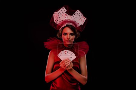 Photo for Portrait stunning lady casino night dealer shuffling cards wear vintage theme gown isolated red light black background. - Royalty Free Image