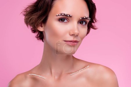 Photo for Portrait of lady prepare for wealthy occasion modern body care procedure with gemstone on pink background. - Royalty Free Image