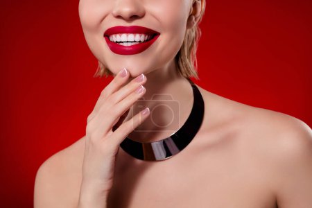Photo for Photo of fancy rich lady nude shoulders arm chin red lips smiling isolated red ruby color background. - Royalty Free Image