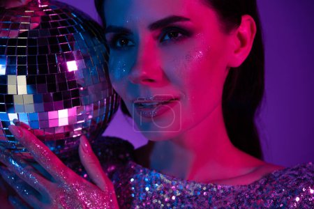 Photo for Portrait of chic classy lady dj on discotheque with disco ball christmas event isolated neon futuristic background. - Royalty Free Image