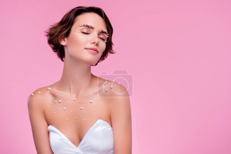 Photo for Photo of attractive fiancee lady wear white bridal dress with expensive gemstone decor over pink background. - Royalty Free Image