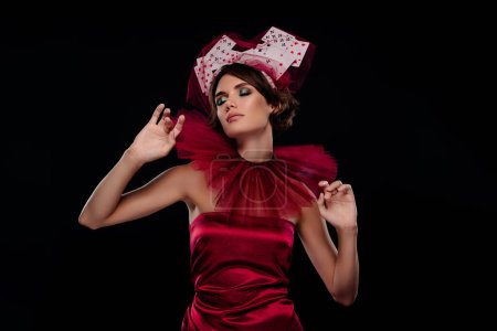 Photo for Charming lady wear casino cards hat veil red chiffon dress high fashion vintage collar visit poker night casino. - Royalty Free Image
