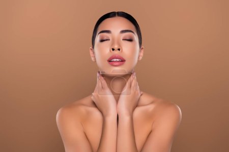Photo for Photo of gorgeous tender cute lady touch neck perfect ideal soft moisturized skin isolated on beige color background. - Royalty Free Image