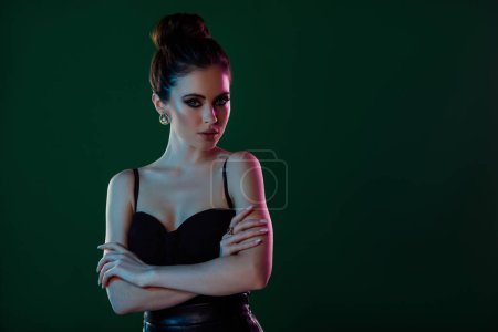 Photo for Photo of sweet lady with decollete folded arms advertise diamond earrings boutique isolated on green color background. - Royalty Free Image