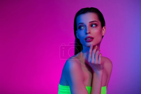 Photo for Photo of attractive tender gentle girl touch look neon vibrant empty space thinking choose promo offer. - Royalty Free Image