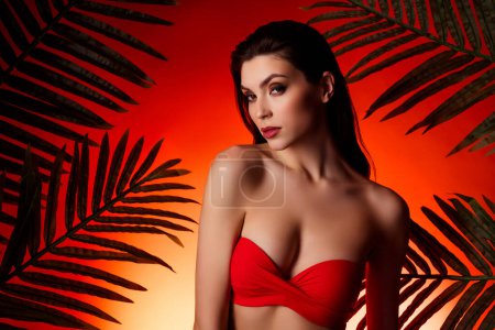 Photo for Photo of adorable sexy lady dressed red bikini woman enjoying summer spa isolated orange color background. - Royalty Free Image