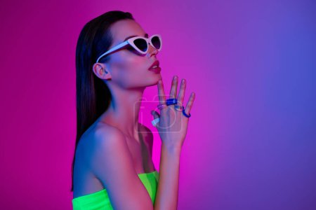 Photo for Profile photo of stunning cool girl with bijouterie rings touch chin hands enjoy wait discotheque advertisement. - Royalty Free Image
