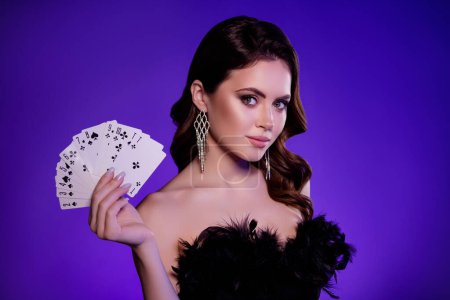 Photo of hot chic attractive lady aristocrat enjoy vogue event occasion in casino professional playing poker.
