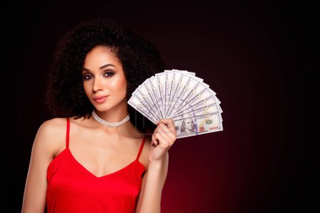 Photo for Photo of charming gorgeous lady professional gamer win jackpot fortune luck isolated over dark red background. - Royalty Free Image