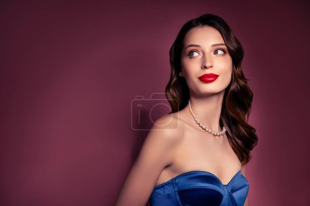 Photo for Photo of girl wear blue cocktail gown pearl pendant look over brown empty space background. - Royalty Free Image