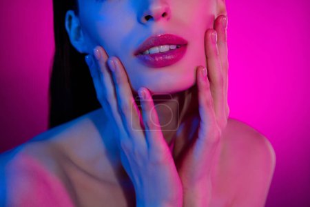 Photo for Cropped close up photo of chic elegant lady touch applying cream foundation for makeover over vivid background. - Royalty Free Image