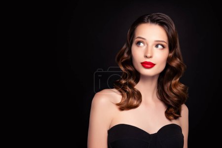 Photo of classy pretty lovely lady actress look empty space on vip event occasion over dark background.
