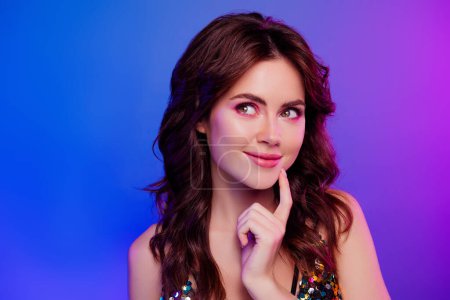 Photo for Photo portrait of attractive young woman look thoughtful empty space touch chin isolated on retro neon light background. - Royalty Free Image