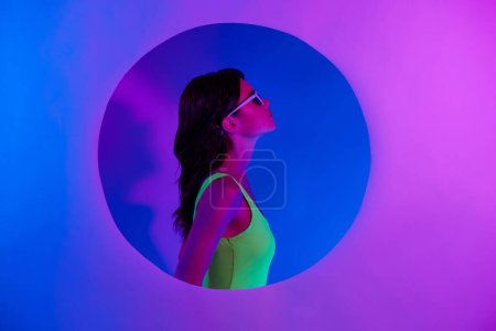 Photo for Profile side photo of girl with sunglass standing in circle hole isolated color neon vivid background. - Royalty Free Image