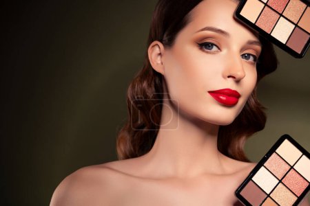 Photo for Adorable fancy classy woman advertise professional palette variety of matte and shiny colors for make up empty space. - Royalty Free Image