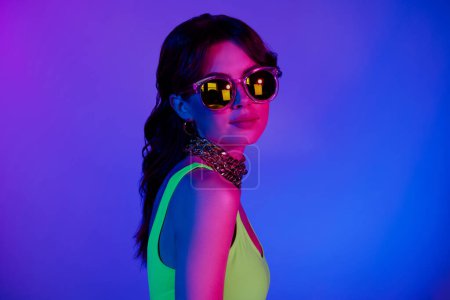 Photo for Photo of cool girl wear sunglass bodysuit look in camera isolated vibrant vivid neon background. - Royalty Free Image