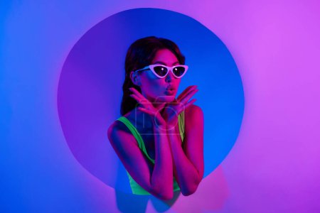 Photo for Photo of girl in sunglass look empty space hold hands make lips pouted isolated pink color neon background. - Royalty Free Image