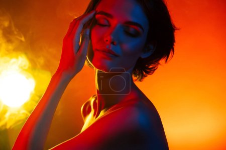 Photo for Photo of charming dreamy lady wear nothing close eyes enjoying steam shower isolated orange filter color background. - Royalty Free Image