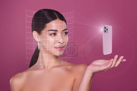 Foto de Creativo 3d collage abstracto de la señora asiática utilizando gadget para probar la piel aplicación cara de escaneo. - Imagen libre de derechos