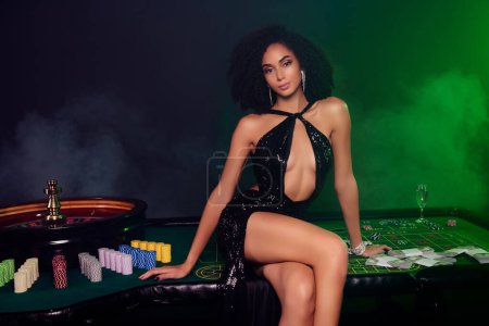 Photo for Photo of chic attractive hot lady croupier in private vip poker club welcome invite player for lucky chance. - Royalty Free Image