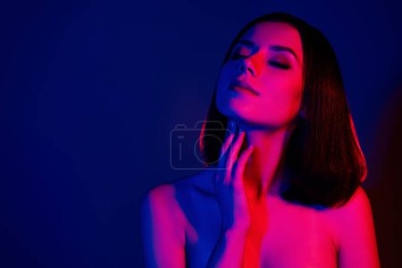 Photo for Photo of girl touch neck finger feel tenderness close eyes isolated neon futuristic color background. - Royalty Free Image
